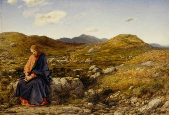 Painting of Jesus Christ sitting on some rocks, looking downcast